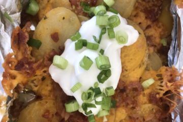 Foil Packet Potatoes with cheese,bacon,sour cream and green onions
