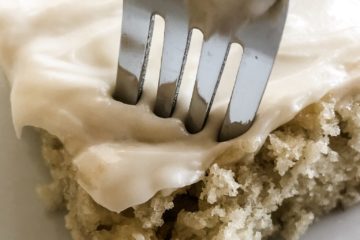 perfect bite of soft banana cake with cream cheese frosting