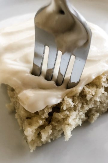 perfect bite of soft banana cake with cream cheese frosting