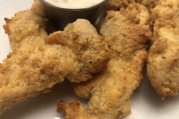 Air Fryer Chicken Strips up close photo with dipping sauce.