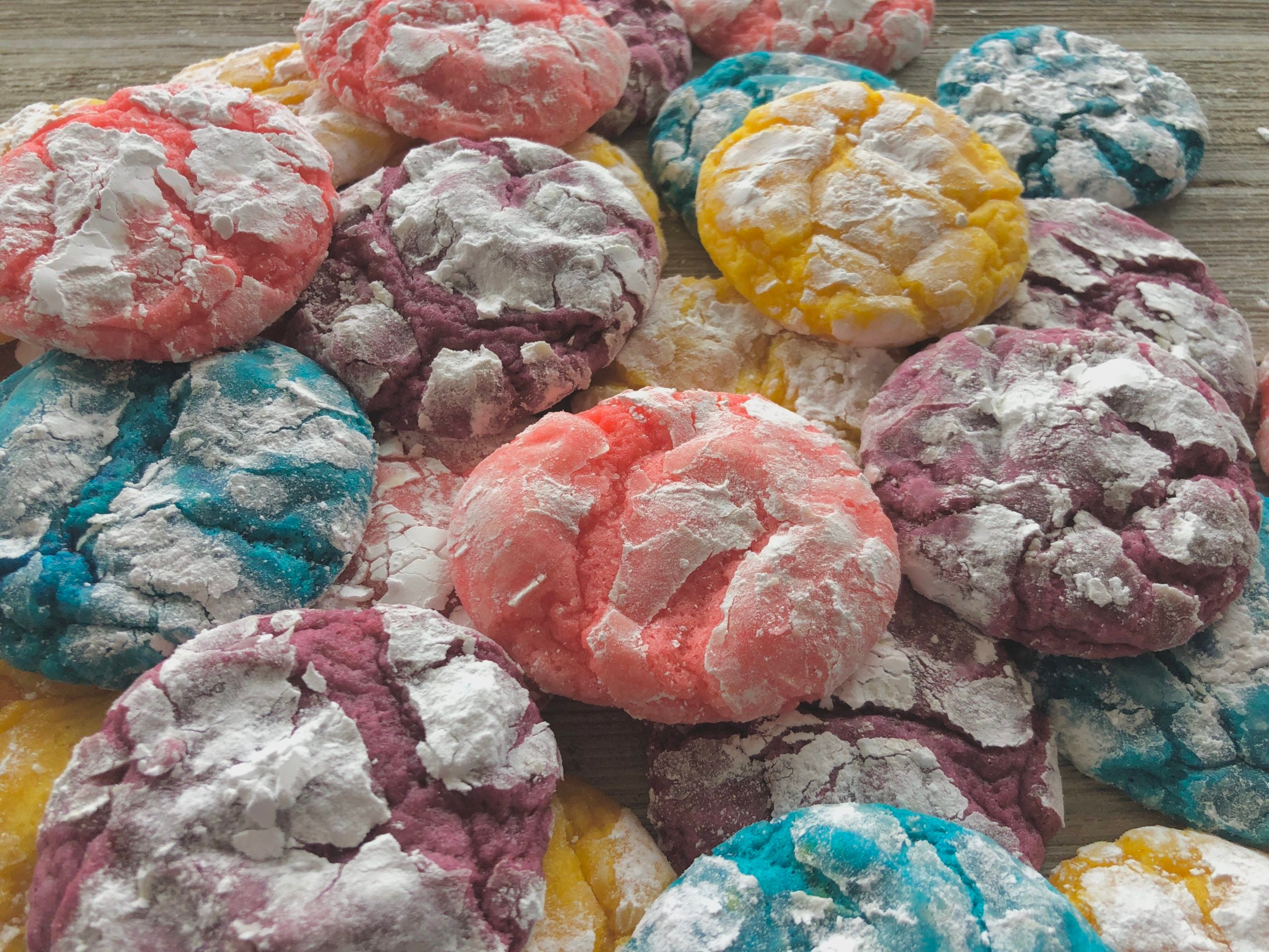 A pile of all of the colors of Easter Crinkle Cookies