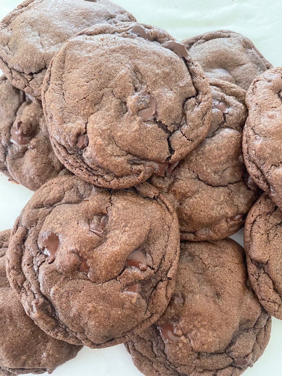 A pile of double chocolate chip brownie cookies.